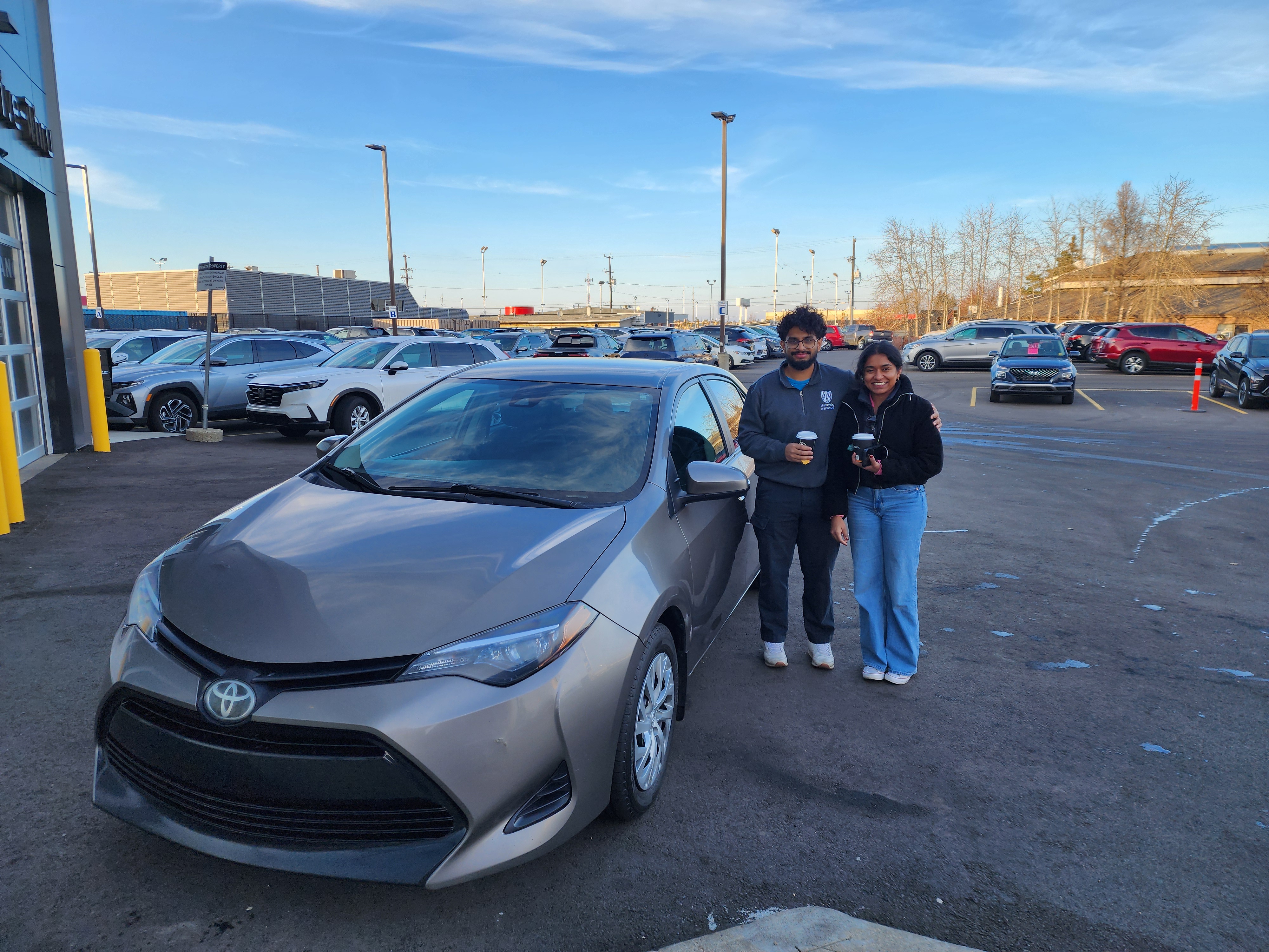Happy couple with new Toyota