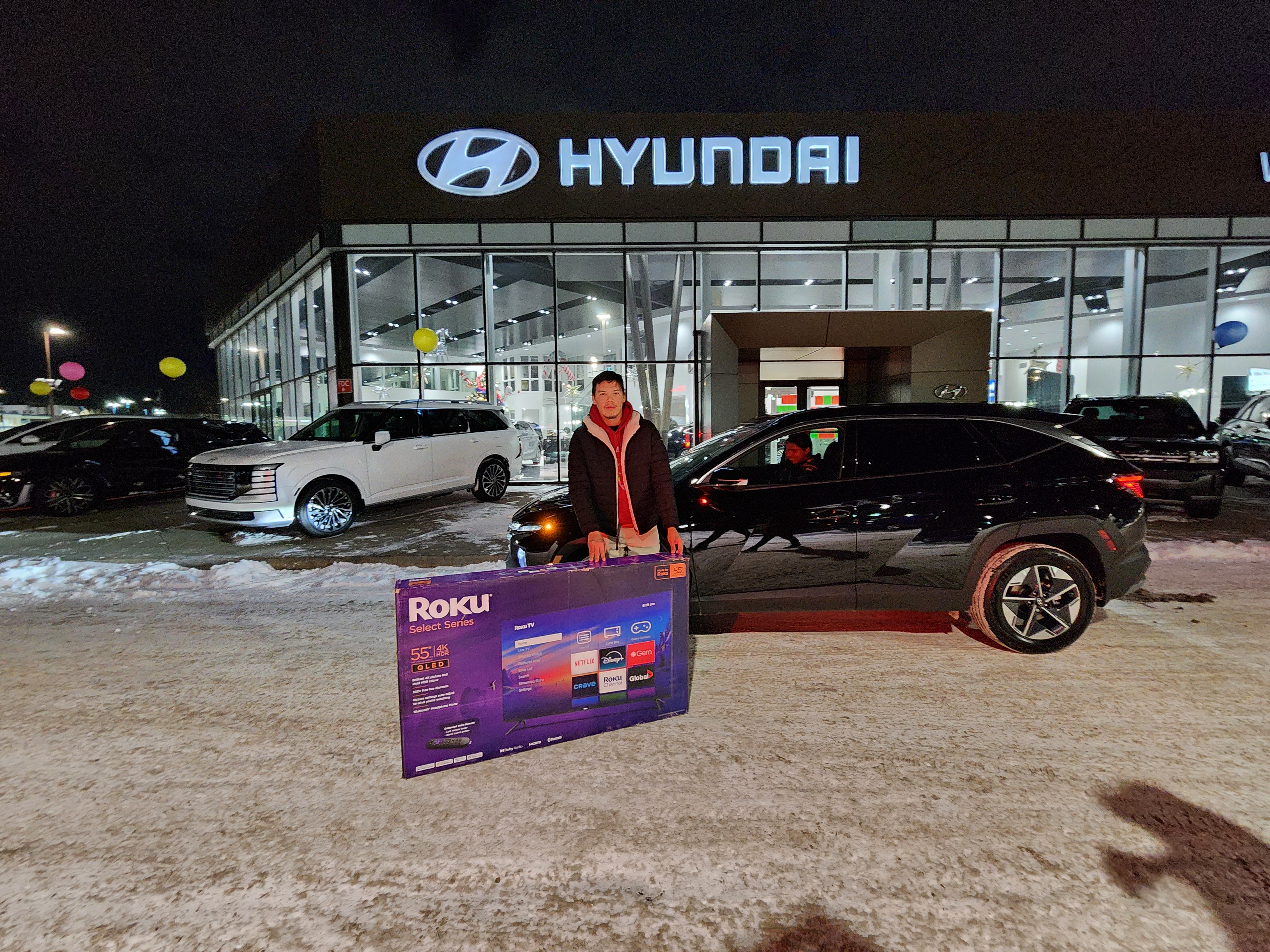 Happy customer with new vehicle
